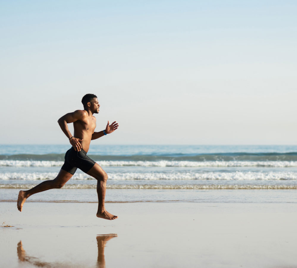 Man Running in the Beach